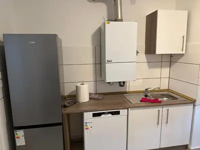 Küche/Küchenzeile in der Unterkunft Holiday-Ferienwohnung Solingen-Mitte