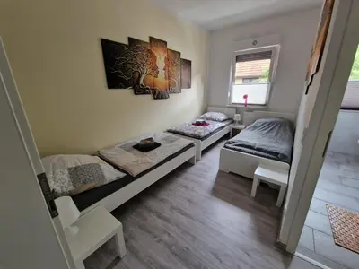 Ein Bett oder Betten in einem Zimmer der Unterkunft Ostwind