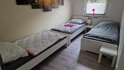 Ein Bett oder Betten in einem Zimmer der Unterkunft Ostwind
