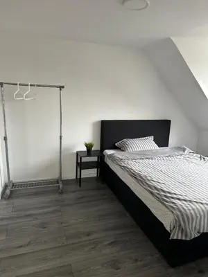 Ein Bett oder Betten in einem Zimmer der Unterkunft HomeBerg Duisburg - feine 3 Zimmer, 4 Betten, 60qm in Top Lage