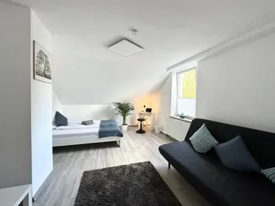 Ein Sitzbereich in der Unterkunft Möbliertes Apartment in Herne-Mitte mit Parkplatz, Arbeitsplatz, WLAN- Super Anbindung an Autobahnen und ÖPNV -Für 1bis 3 Personen