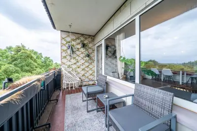 Ein Balkon oder eine Terrasse in der Unterkunft SuperSuite2 BohoApartment Balkon