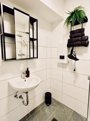 Ein Badezimmer in der Unterkunft SuperSuite2 BohoApartment Balkon