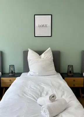 Ein Bett oder Betten in einem Zimmer der Unterkunft Salí - Remscheid - Apartmenthaus