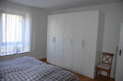 Ein Bett oder Betten in einem Zimmer der Unterkunft Ferienwohnung Haus am Fluß