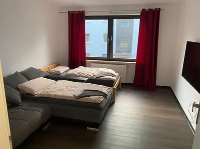 Ein Bett oder Betten in einem Zimmer der Unterkunft 1 Zimmer Ferienwohnung in Essen