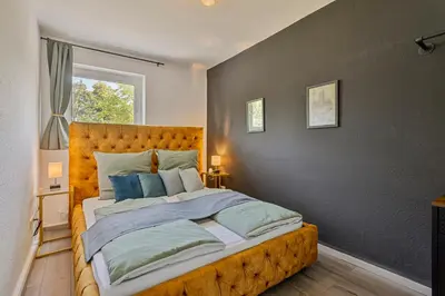 Ein Bett oder Betten in einem Zimmer der Unterkunft Science trifft Helden by CordisSky 15 Minuten zu Fuß vom Hauptbahnhof Essen