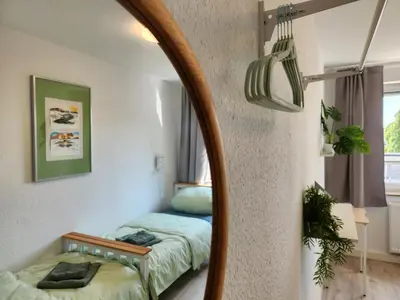 Ein Bett oder Betten in einem Zimmer der Unterkunft ELENA flat Maiglöckchen CentrO Westfield Centro