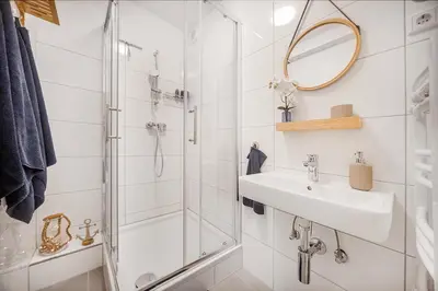 Ein Badezimmer in der Unterkunft Excellence Deluxe Suite mit Balkon & Stadtblick - zentral an der Messe Essen