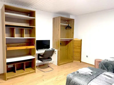Ein Sitzbereich in der Unterkunft VAZ Apartments Schürmann für Monteure, Küche, WLAN, Parkplatz, Autobahnnah