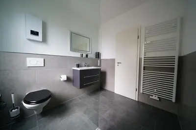 Ein Badezimmer in der Unterkunft Gemütliche Suite im Erdgeschoss - WLAN