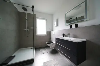 Ein Badezimmer in der Unterkunft Gemütliche Suite im Erdgeschoss - WLAN