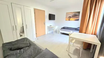 Ein Bett oder Betten in einem Zimmer der Unterkunft -CS24- Six rooms apartment with terrace - KP01
