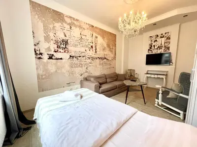 Ein Sitzbereich in der Unterkunft Paris Suite für 4 mit Küche und WIFI