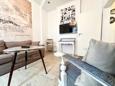 TV/Unterhaltungsangebot in der Unterkunft Paris Suite für 4 mit Küche und WIFI