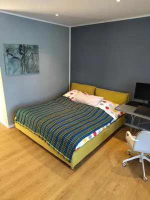 Ein Bett oder Betten in einem Zimmer der Unterkunft Großzügige Ferienwohnung in innovativem Zero-Emissionen Haus