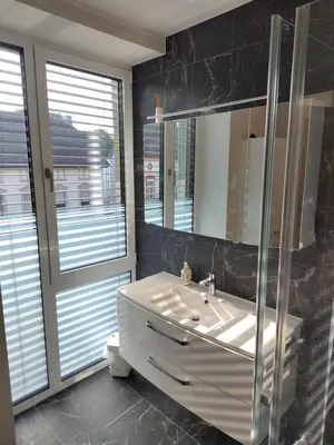 Ein Badezimmer in der Unterkunft Großzügige Ferienwohnung in innovativem Zero-Emissionen Haus