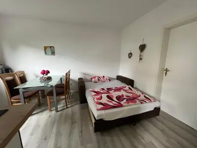 Ein Bett oder Betten in einem Zimmer der Unterkunft Waldnest