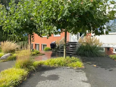 Ein Garten an der Unterkunft Airport-Messe Apartment, fußläufig erreichbar 3
