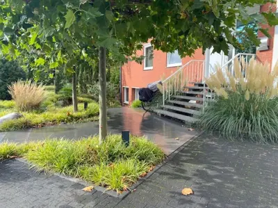 Ein Garten an der Unterkunft Airport-Messe Apartment, fußläufig erreichbar 3