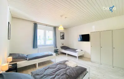 TV/Unterhaltungsangebot in der Unterkunft SASI HOMES - WorkBase