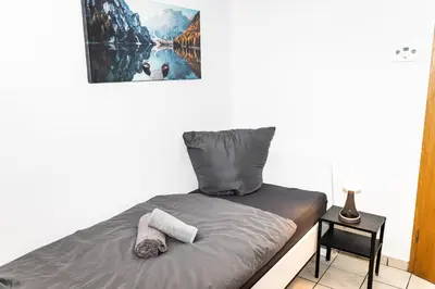 Ein Bett oder Betten in einem Zimmer der Unterkunft CosyHomes24 - Centrally with parking space - HA01