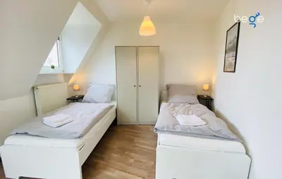 Ein Bett oder Betten in einem Zimmer der Unterkunft SASI HOMES Business Lodge