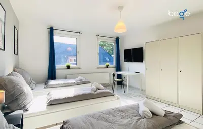 Ein Bett oder Betten in einem Zimmer der Unterkunft SASI HOMES WorkNest
