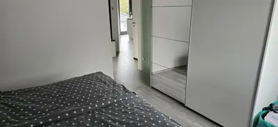 Ein Bett oder Betten in einem Zimmer der Unterkunft Wohnung Düsseldorf Ratingen nähe Messe Flughafen Uni Essen
