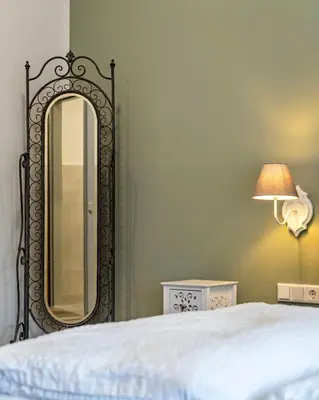 Ein Bett oder Betten in einem Zimmer der Unterkunft Flora Comfort Inn