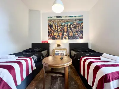 Ein Bett oder Betten in einem Zimmer der Unterkunft NewYork Suite für 4 mit Küche und WIFI