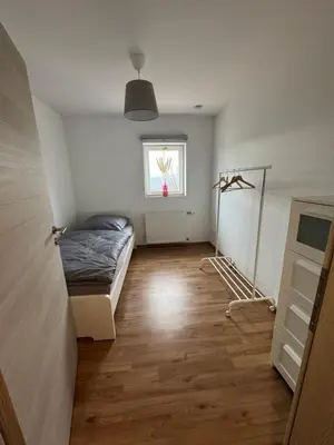 Ein Bett oder Betten in einem Zimmer der Unterkunft Ferienhaus Auf der Drossel