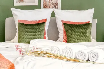Ein Bett oder Betten in einem Zimmer der Unterkunft NEU Life&Work in Mülheim mit Garten
