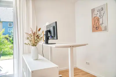 TV/Unterhaltungsangebot in der Unterkunft NEU Life&Work in Mülheim mit Garten