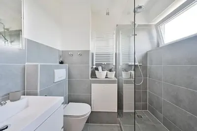 Ein Badezimmer in der Unterkunft SANO - Hagen - Karl Ernst Osthaus