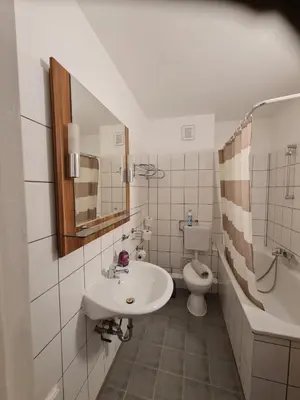 Ein Badezimmer in der Unterkunft Tam Wohnung
