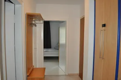 Ein Bett oder Betten in einem Zimmer der Unterkunft Tam Wohnung