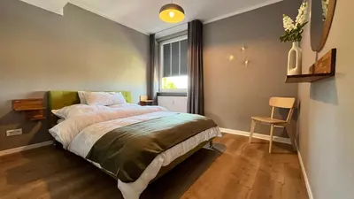 Ein Bett oder Betten in einem Zimmer der Unterkunft Chez Phéline