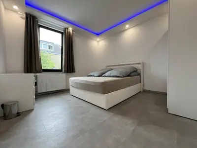 Ein Bett oder Betten in einem Zimmer der Unterkunft Schöne Mitte von Oberhausen