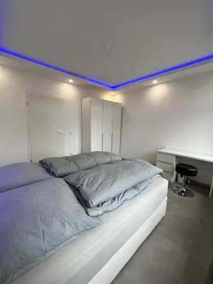 Ein Bett oder Betten in einem Zimmer der Unterkunft Schöne Mitte von Oberhausen