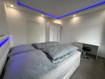 Ein Bett oder Betten in einem Zimmer der Unterkunft Schöne Mitte von Oberhausen