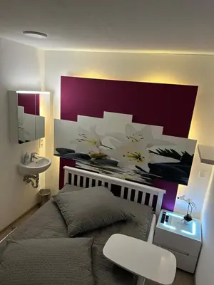 Ein Bett oder Betten in einem Zimmer der Unterkunft My Home Hostel Deluxe Lüdinghausen