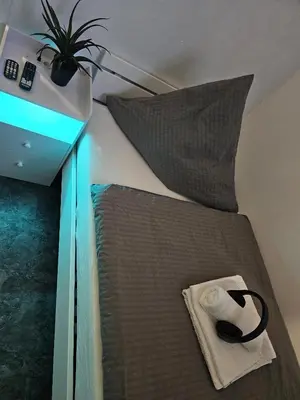 Ein Bett oder Betten in einem Zimmer der Unterkunft My Home Hostel Lüdinghausen