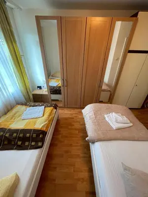Ein Bett oder Betten in einem Zimmer der Unterkunft MAD Ferienwohnungen 2