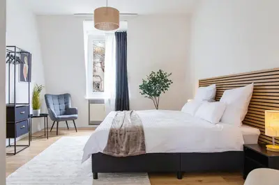 Ein Bett oder Betten in einem Zimmer der Unterkunft stayVision FS43 Wohnung 7 - 1 Schlafzimmer - 4 Gäste - top WLAN