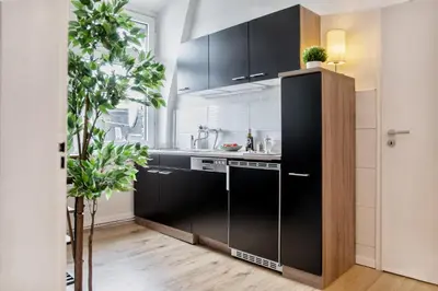 Küche/Küchenzeile in der Unterkunft stayVision FS43 Wohnung 7 - 1 Schlafzimmer - 4 Gäste - top WLAN