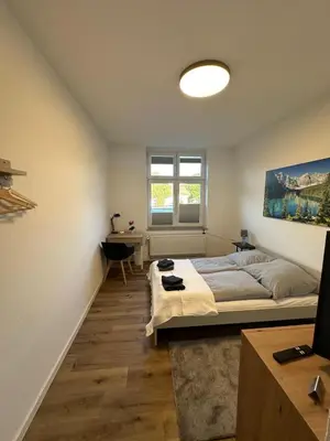 Ein Bett oder Betten in einem Zimmer der Unterkunft After-Work-Home 2