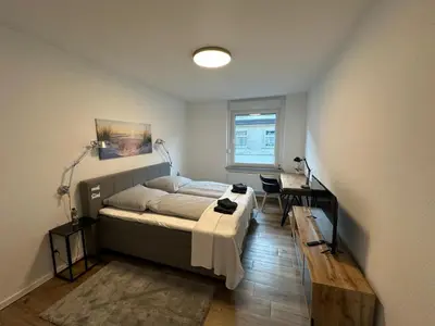 Ein Bett oder Betten in einem Zimmer der Unterkunft After-Work-Home 2