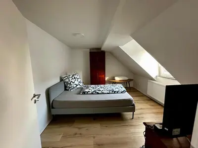 Ein Bett oder Betten in einem Zimmer der Unterkunft Bee Flats