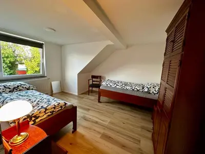 Ein Bett oder Betten in einem Zimmer der Unterkunft Bee Flats